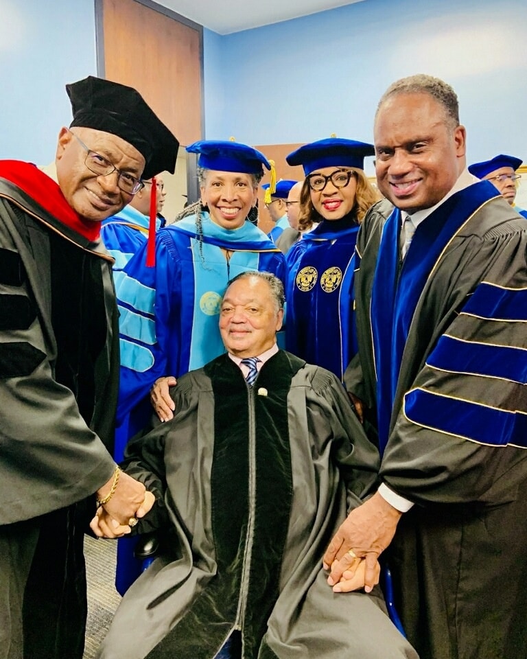 Reverend Jackson with Dr. Gantt and various SUSLA Jaguars