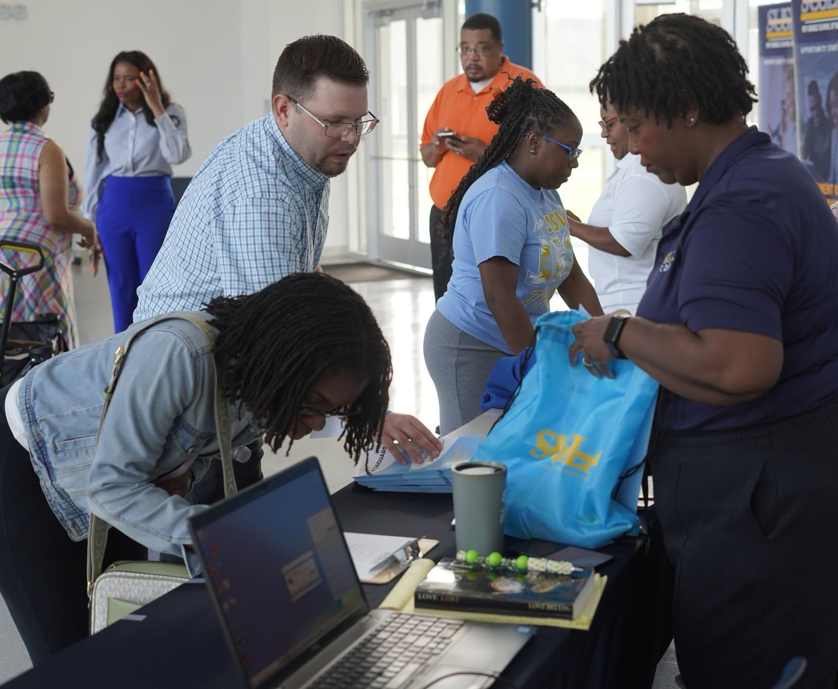 Students sign in to New Student Orientation.