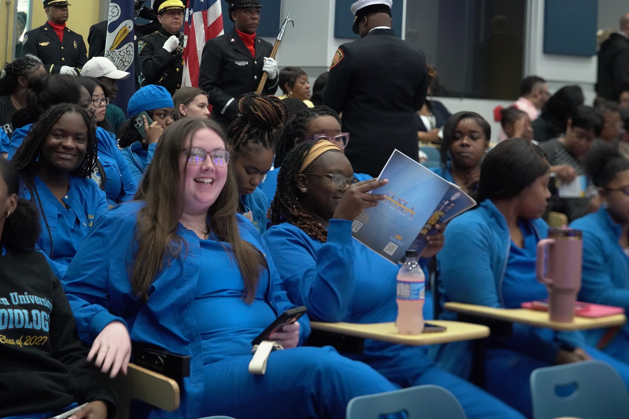 Smiling nursing students in the audience