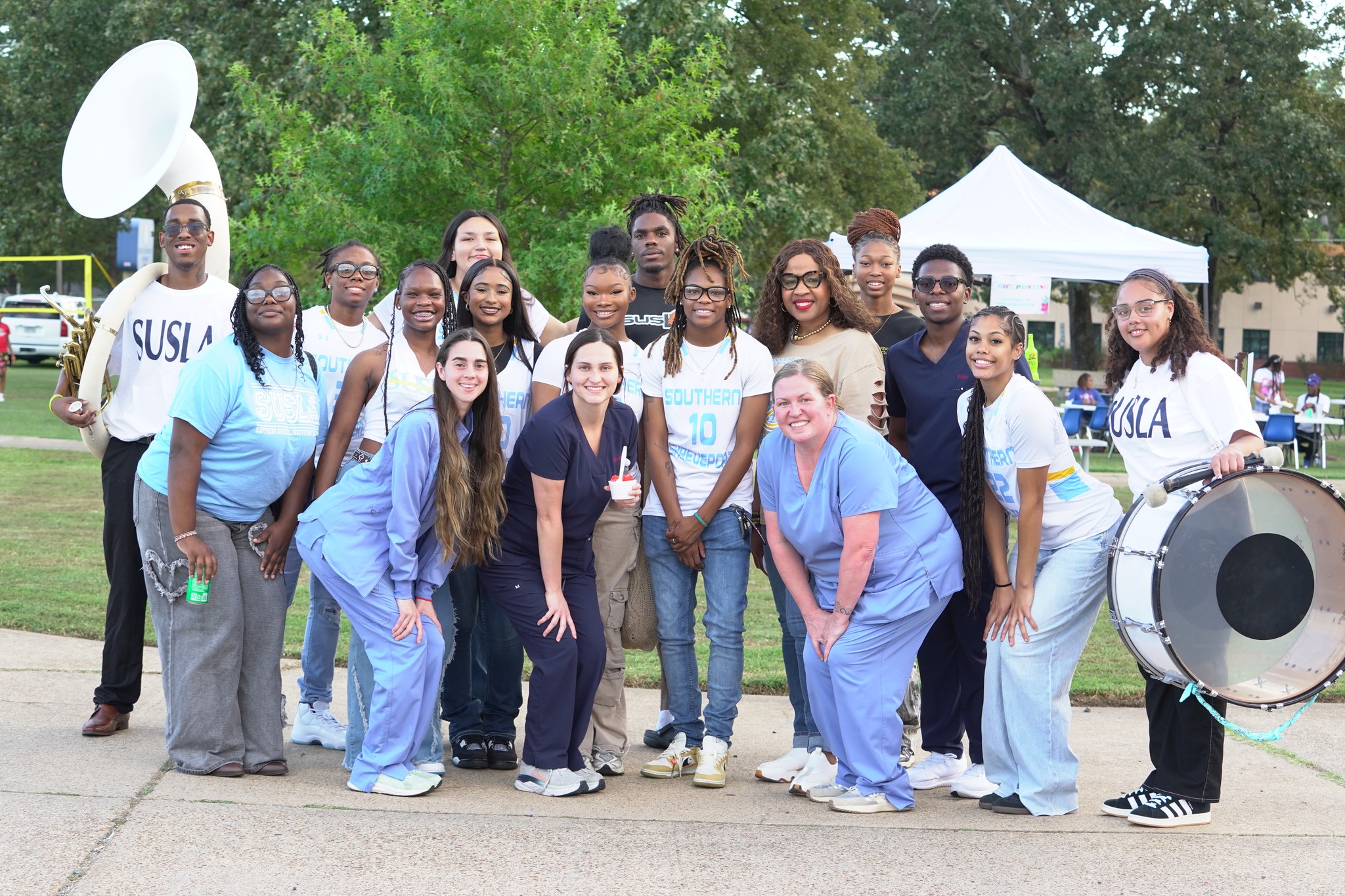 Dr. Gantt with Jaguar family outside